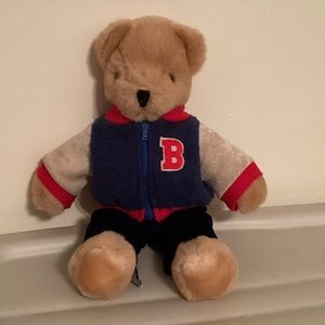 Carousel by Guy vintage teddy bear in a Varsity Jacket & corduroy jeans.